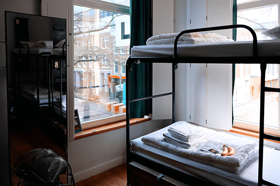 Sample photo: a shared room with metal bunk beds